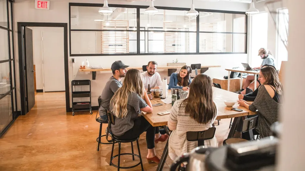 Group of people in discussion around a table