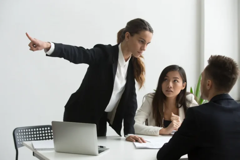 Female HR consultant asking a time-waster to leave her office