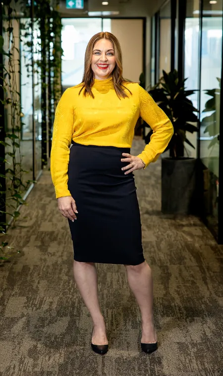 Donna Benjamin standing in office hallway